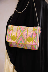 Multicolor beaded clutch bag showcasing a multicolor boho clutch for women styled as a premium multicolor fabric bag for festive wear.