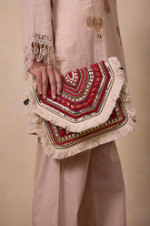 Red beaded fabric clutch bag showcasing a red boho clutch for women styled as a premium red ethnic evening purse.