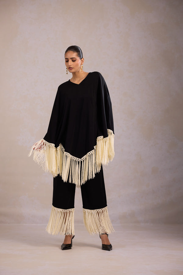 Black co-ord set for women in fluid crepe featuring tassel detailing and V neck design