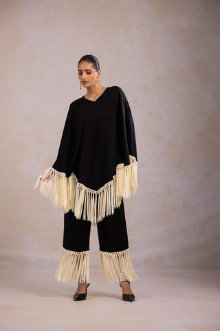 Black co-ord set for women in fluid crepe featuring tassel detailing and V neck design