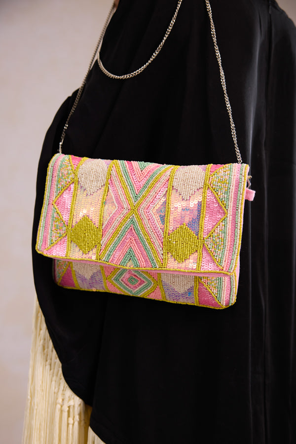 Multicolor beaded clutch bag showcasing a multicolor boho clutch for women styled as a premium multicolor fabric bag for festive wear.