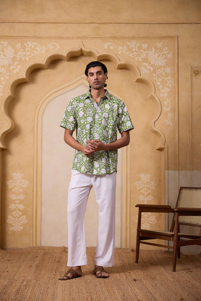 Green block printed shirt for men showcasing a comfortable men's green half sleeve cotton shirt with a unique block print detailing style for vacations.